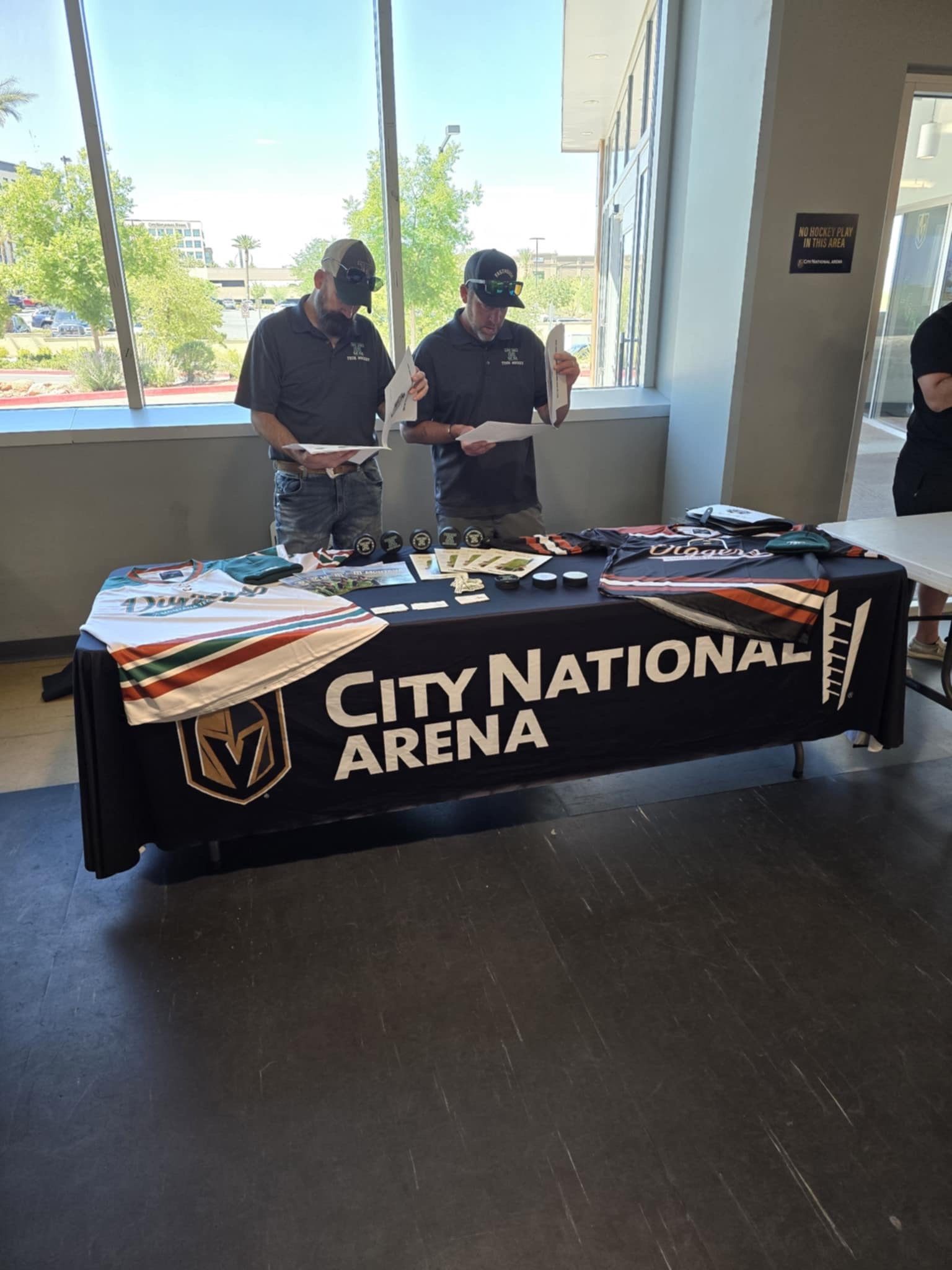  Montana Tech  Assistant Coach Josh Coulombe, and  Scholarship Specialist, Jason Brown at Tech’s recruiting table 