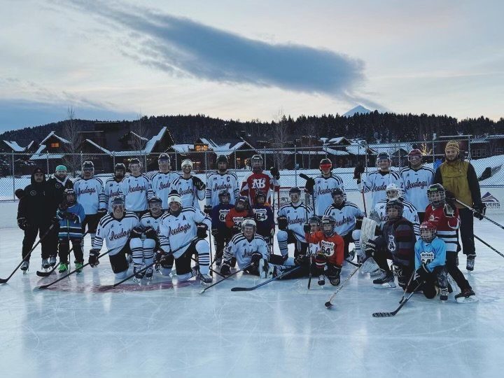  The Bozeman Icedogs with the youth players in Big Sky, Montana 