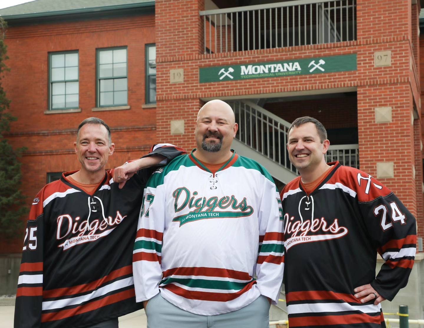   Chancellor Les Cook, Dean of Students Joe Cooper, and Athletic Director Matt Stepan with their Tech Hockey sweaters 
