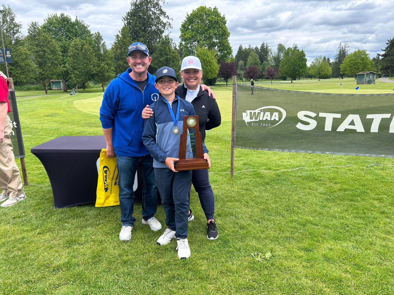 Joe and parents James and Gina after winning the WIAA State Championship (Submitted Photo)