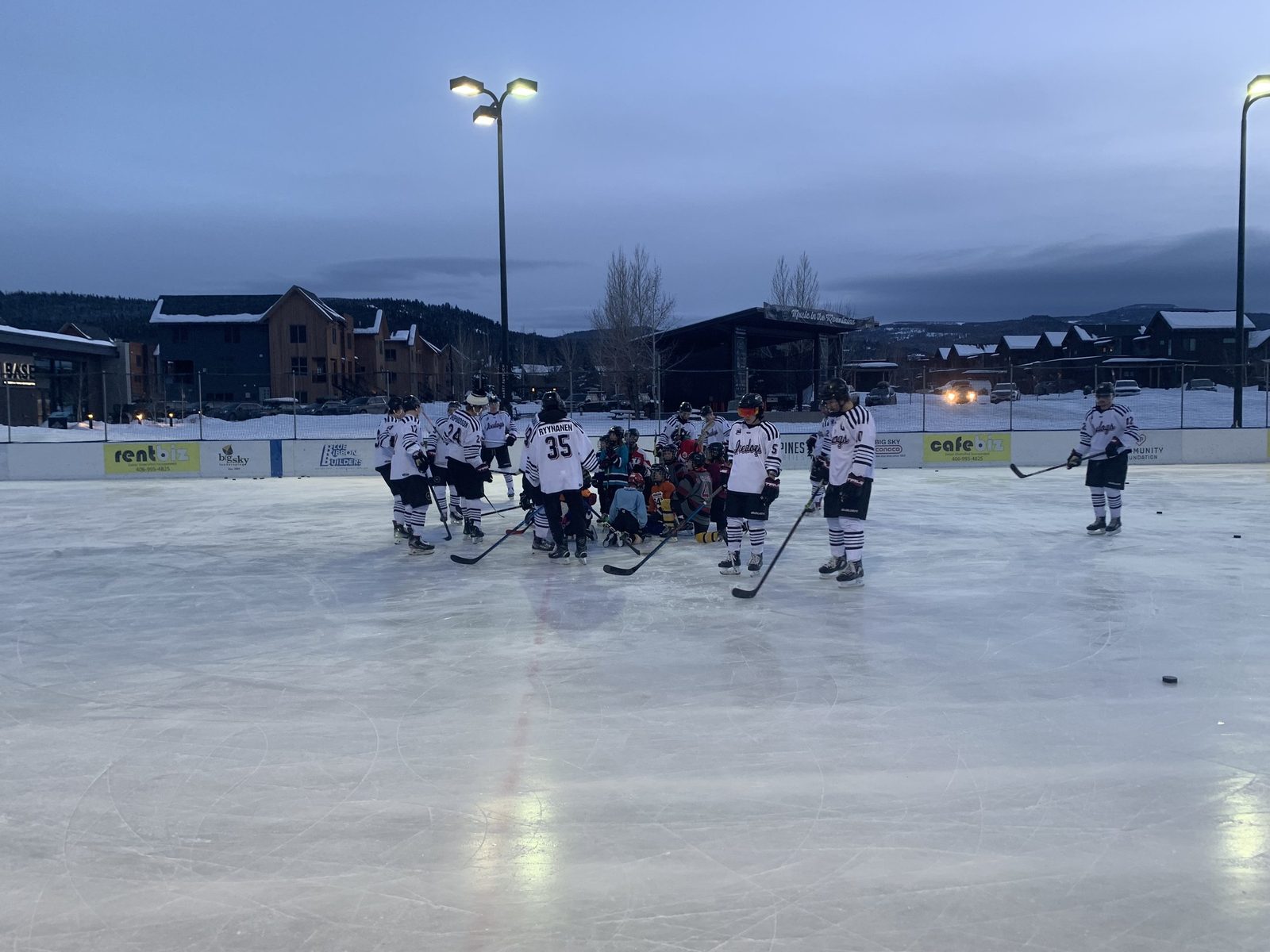 The Bozeman Icedogs with the youth players in Big Sky, Montana