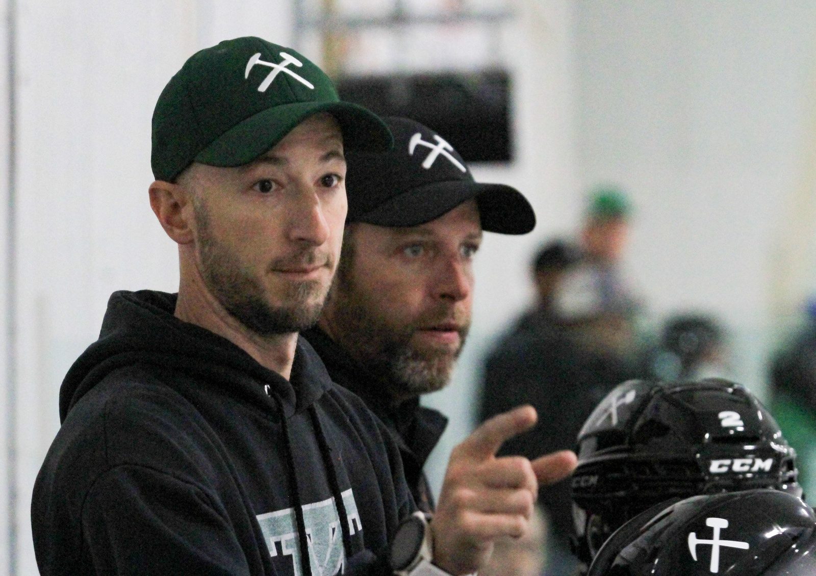  Montana Tech's Coaching Staff  (Rathgeber and Josh Coulombe) from the Bench  